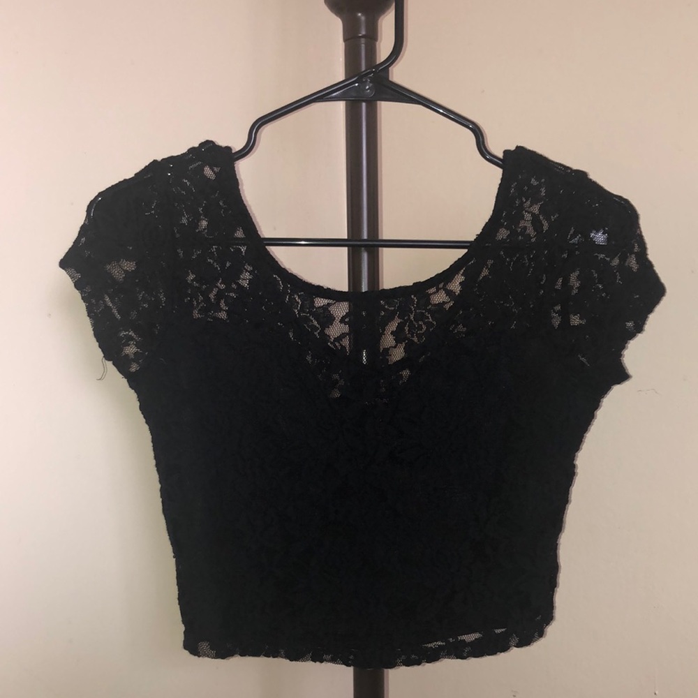 Black lace crop top. NEVER WORN. Size XS. Brand is Material Girl.